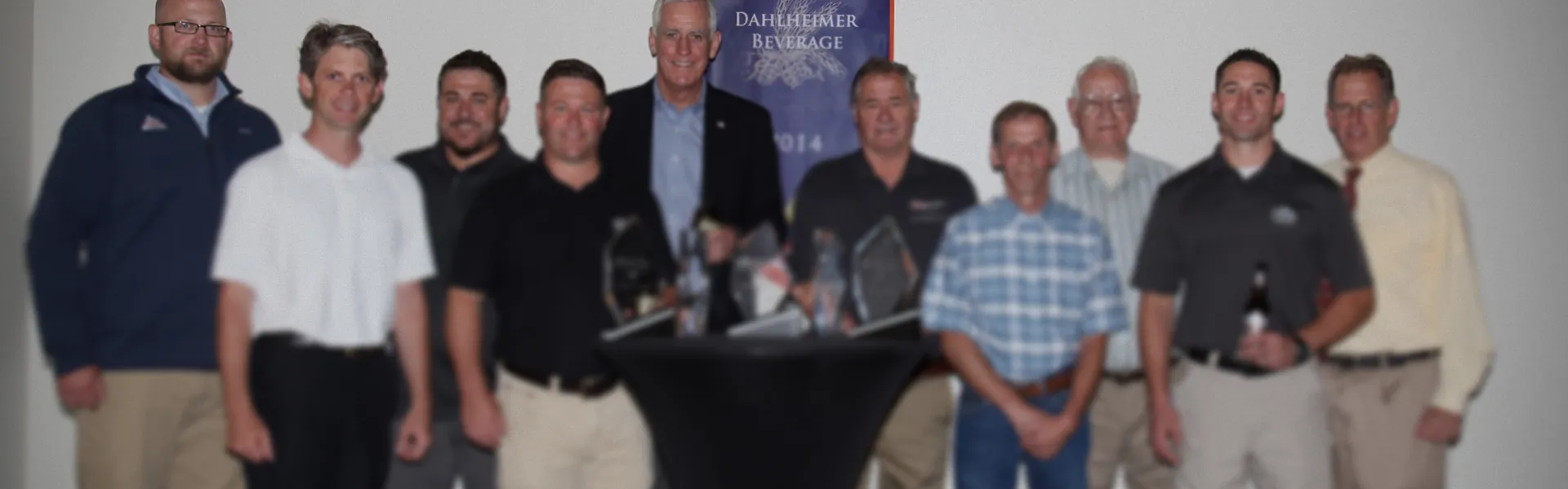 Dahlheimer Beverage team posing together at an award ceremony